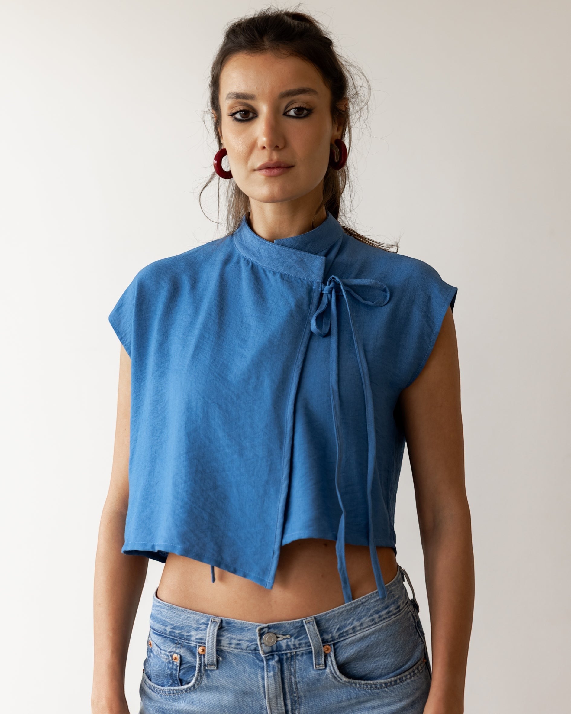 FSociety steel blue lightweight fabric wrap-front knot top with mock neck and cap sleeves